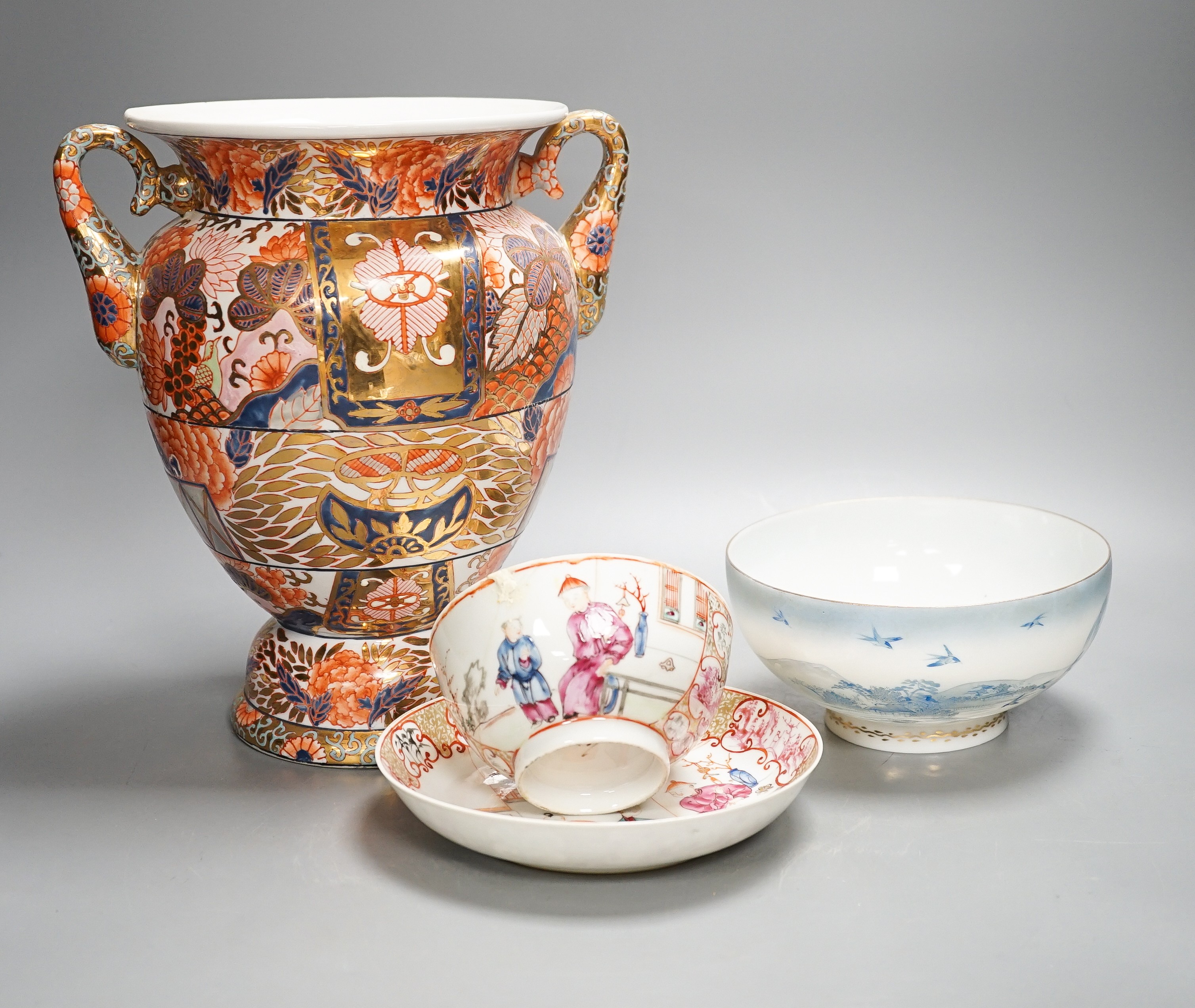 A twin handled Imari palette vase, a Japanese eggshell porcelain footed bowl, together with an 18th century Chinese porcelain bowl and saucer (with damage) 25cm (4)